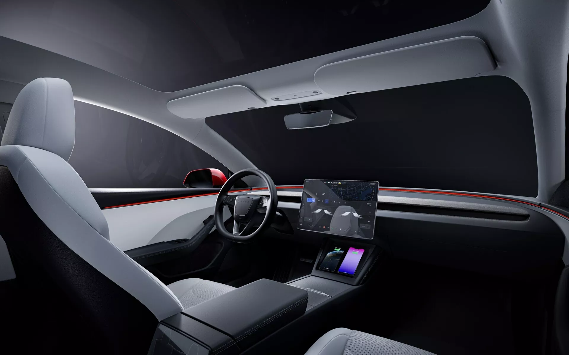 Interiör av Tesla Model 3 2023 (1:a generationen - ansiktslyft) som visar främre kabinen med en modern design på instrumentbrädan som inkluderar omgivningsbelysning med rött accentljus, en förenklad tvåekrad ratt med integrerade kontroller, en framträdande central pekskärm för navigation och media, minimalistisk gränssnitt för klimatkontroll, premiumklädda framsäten, en snygg mittkonsol med en trådlös laddningsplatta, minimalistisk förardörrpanel med beröringskänsliga kontroller, och förbättrad inre omgivningsbelysning för en lyxig teknikdriven känsla.